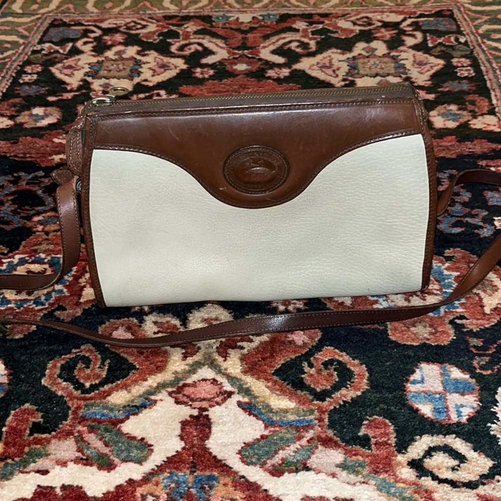 Retro 1990’s Dooney Bourke all weather leather bag. Classic cream and brown